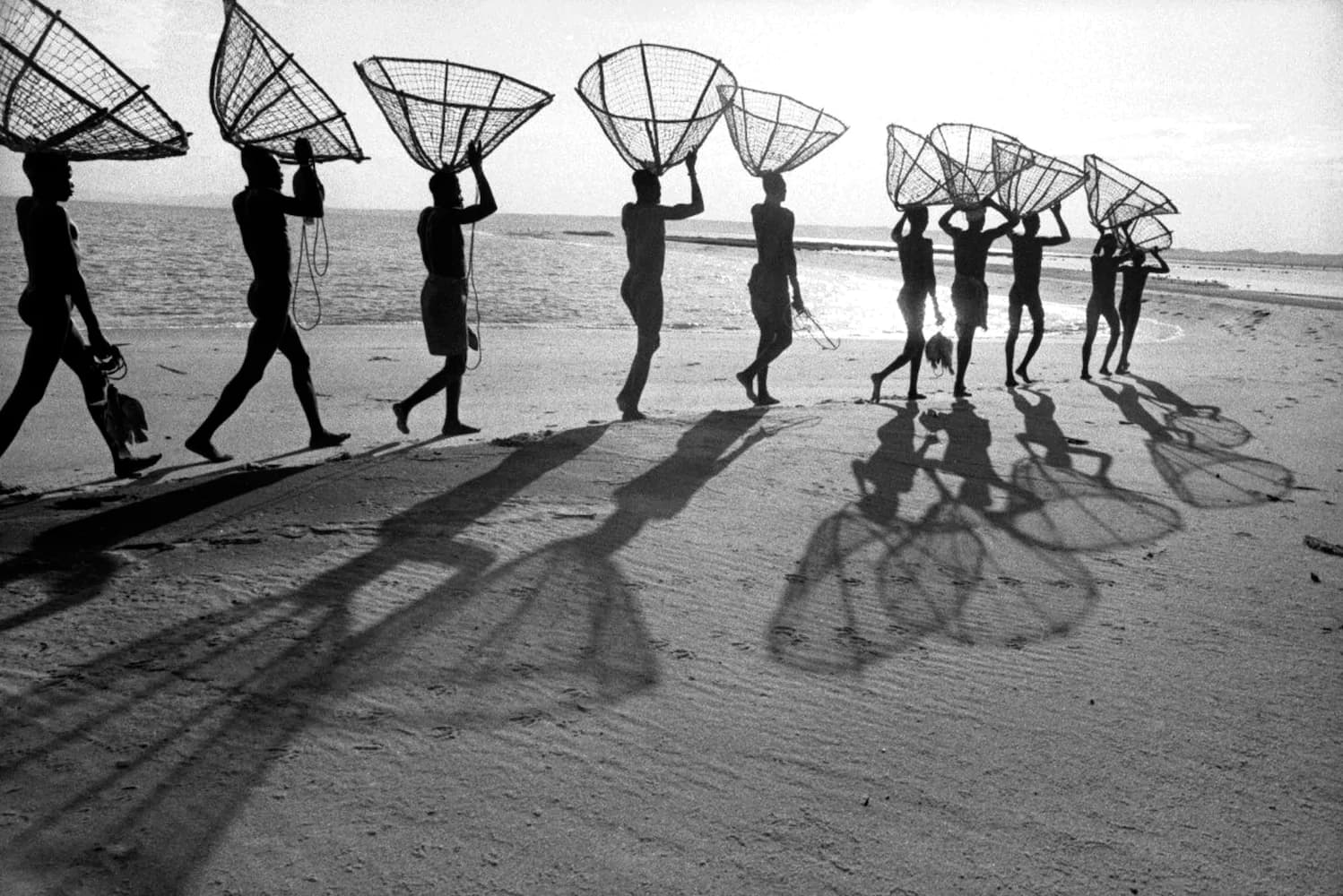Turkana Fishermen Walking in line with Shadows