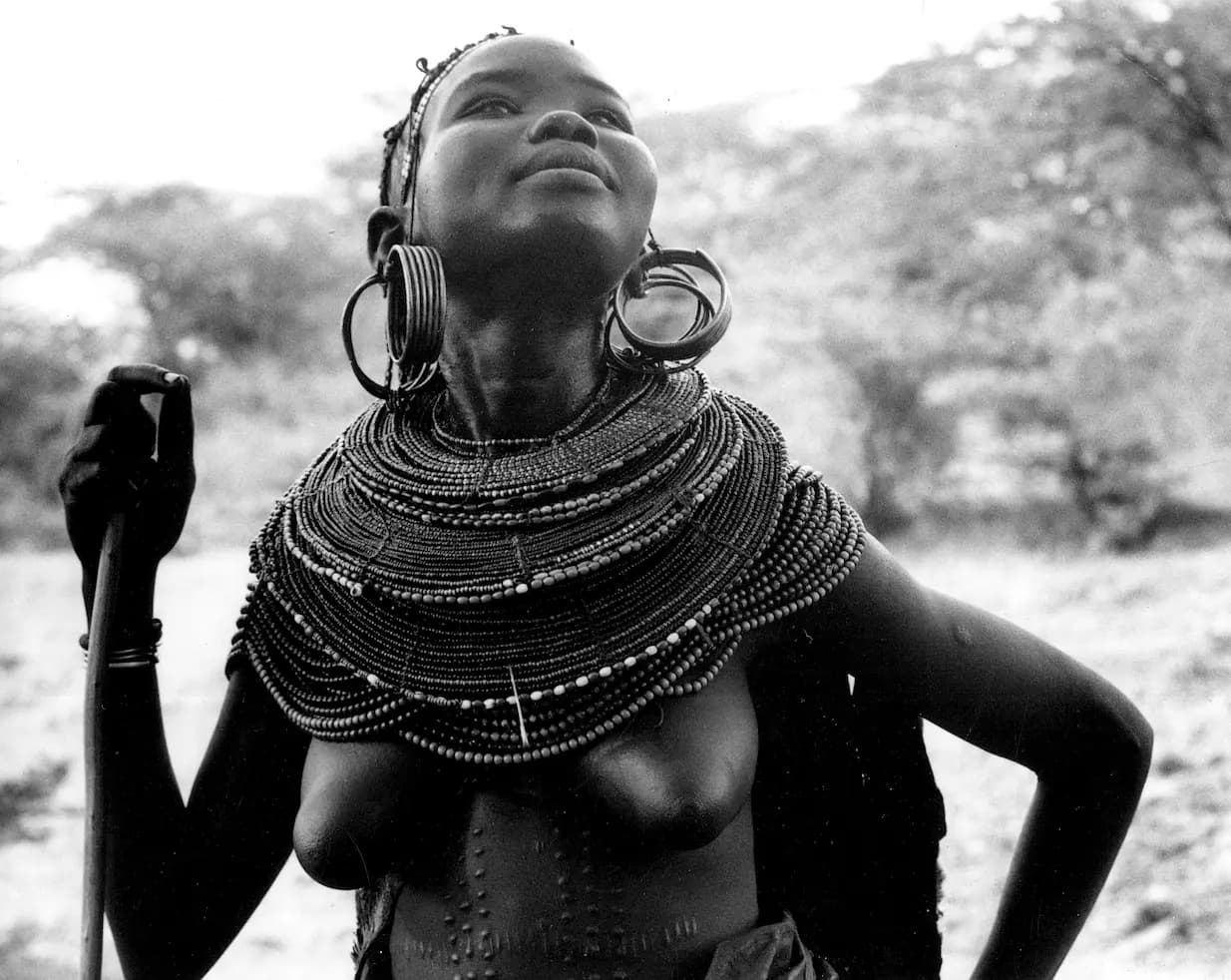 Young Pokot/Suk woman looking up