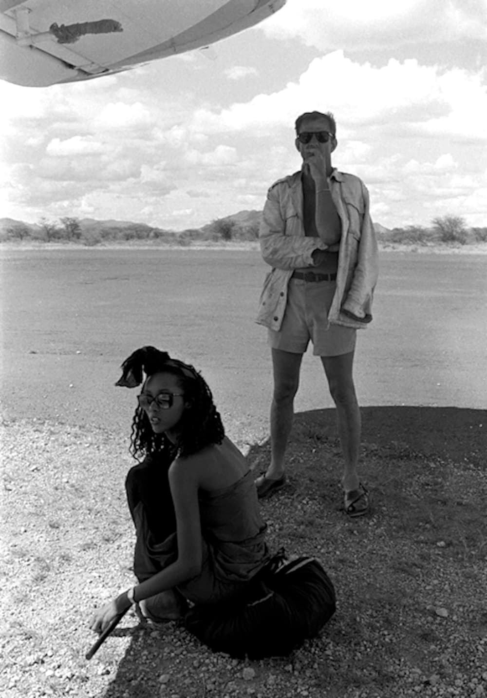 Iman and Peter Shading Under the Plane Wing