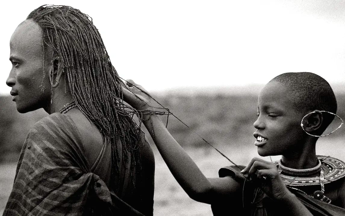 Maasai Girl Measuring Warrior's Hair