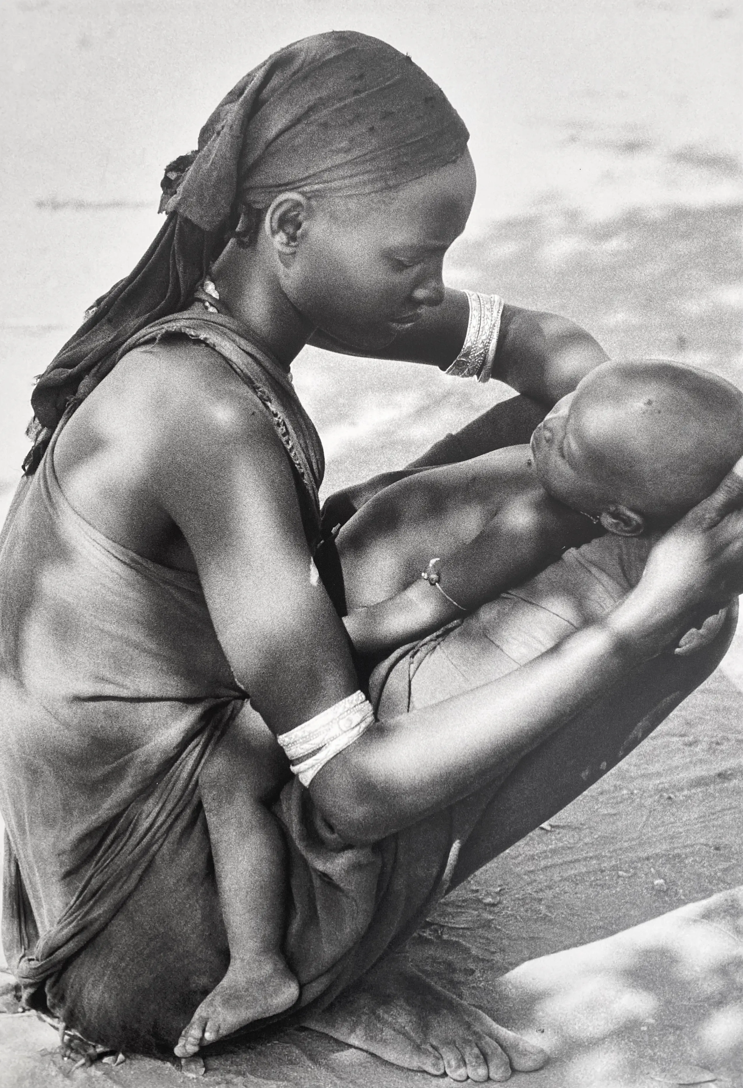 Orma Mother, Child on Knee